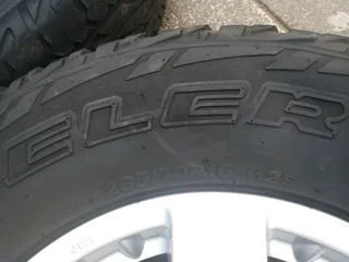 A clean set of 16inches original Nissan hardbody NP300 mags 6x139.7 PCD with Bridgestone tyres