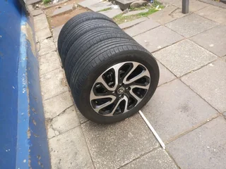 A set of 16inches 4x100 PCD with tyres for Toyota starlet / Suzuki Baleno also fit Toyota yaris