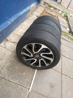A set of 16inches 4x100 PCD with tyres for Toyota starlet / Suzuki Baleno also fit Toyota yaris