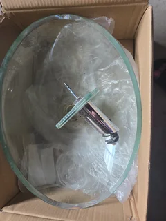 Bathroom basin (glass) with tap