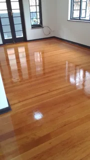SANDING AND SEALING WOODEN FLOORS