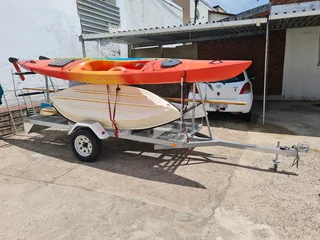 2x kayaks 1 small boat 1 wind surfer with licensed trailer