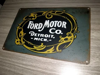 Ford motor company metal garage sign