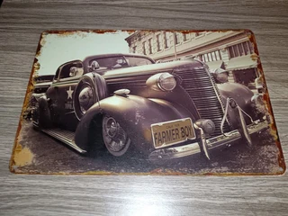 Vintage car metal garage sign