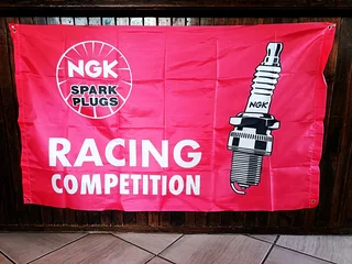 Red NGK spark plug FLAG large