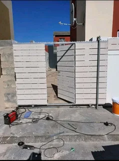we do building boundary wall and nutecgates and panels fencing installation.gate motorinstallation.