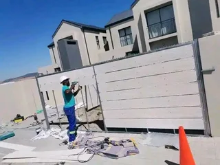 we do building boundary wall and nutecgates and panels fencing installation.gate motorinstallation.