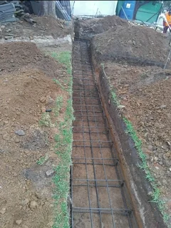 Building boundary walls and gates installation