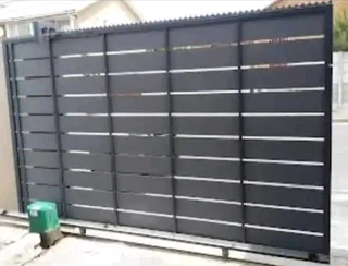 We do nutec gates. Pedestrian gate. Wall extension with nutec cladding .gate motor installation