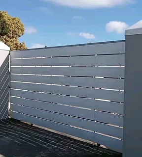 We do nutec gates. Pedestrian gate. Wall extension with nutec cladding .gate motor installation