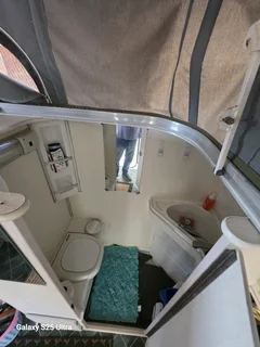 Pensioner perfect 2 berth caravan, full bathroom with shower, hit water geyser, microwave etc.