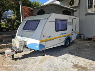 Pensioner perfect 2 berth caravan, full bathroom with shower, hit water geyser, microwave etc.