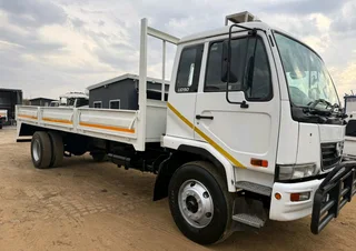 NISSAN UD 90 DROPSIDES
