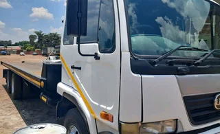 NISSAN UD TAGAXLE ROLLBACK