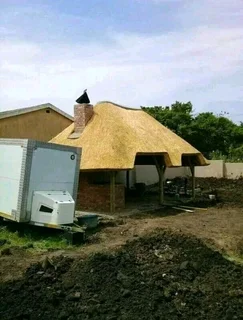 Thatch roof and all repairs install new lapas roundovel and Gazebo