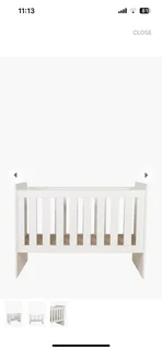White baby cot