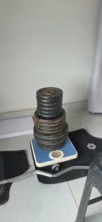 GYM WEIGHTS 65KG  CAST IRON WITH HEAVY BOXING BAG