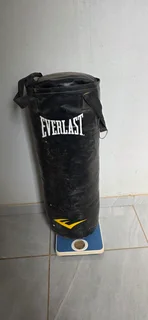 GYM WEIGHTS 65KG  CAST IRON WITH HEAVY BOXING BAG