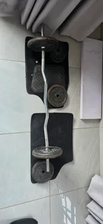 GYM WEIGHTS 65KG  CAST IRON WITH HEAVY BOXING BAG