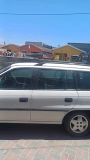 White Astra Estate 160i car