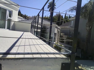 Stainless steel wiring on balcony balustrade and Aluminuim gates