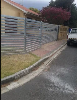 Roll up and sectional garage doors, driveway gates and fencing