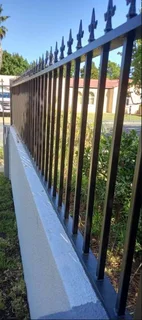 Roll up and sectional garage doors, driveway gates and fencing