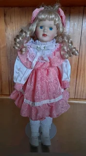 Porcelain Doll on Stand