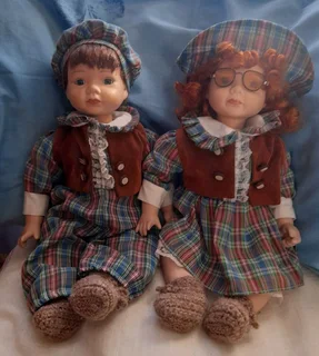 Porcelain Dolls - Boy and Girl