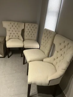 R3899 — Set of 7 beige tufted dining chairs (2 decorative head chairs)