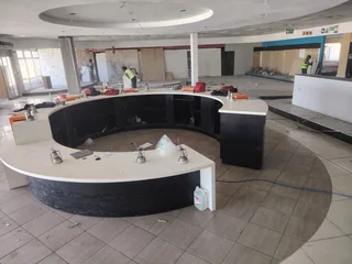 Reception desk, display units, wooden Islands