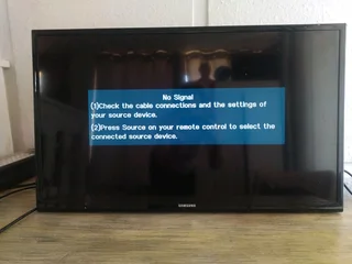 It is a flat-screen LED model, likely around 32 inches in size hisense