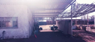 SMALL HOLDING .TWO FLATLETS.STRONG WATER. TWO BOREHOLES.SAVE AREA.CAN BUILD EASY 6 HOUSES.