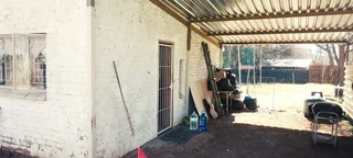 SMALL HOLDING .TWO FLATLETS.STRONG WATER. TWO BOREHOLES.SAVE AREA.CAN BUILD EASY 6 HOUSES.