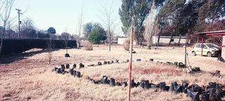 SMALL HOLDING .TWO FLATLETS.STRONG WATER. TWO BOREHOLES.SAVE AREA.CAN BUILD EASY 6 HOUSES.