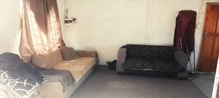 SMALL HOLDING .TWO FLATLETS.STRONG WATER. TWO BOREHOLES.SAVE AREA.CAN BUILD EASY 6 HOUSES.