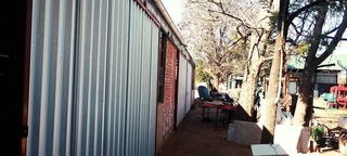 PLOT AVAILABLE WITH TO VERY LARGE GARAGES AND LICENECED MARIJUANA TUNEL