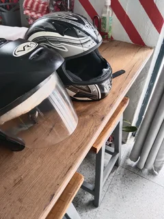 Selling 2 motorbike helmets