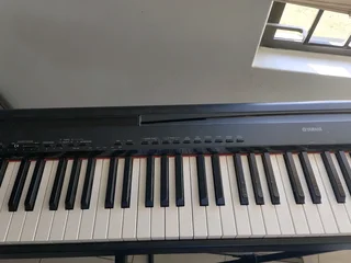 Yamaha P95B piano