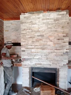 Fireplace installation and waterproofing