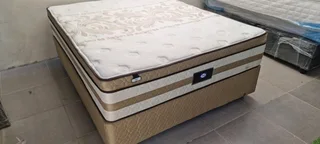 Selling original queen bed with double spring heavy duty matress and base