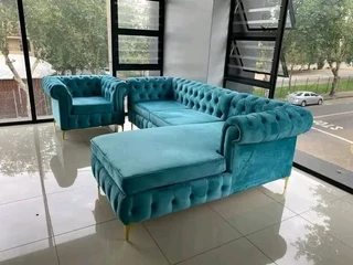 L-shape of buttoned couch