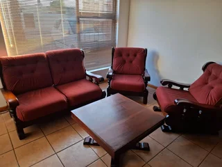 Solid Imbuia wood lounge set.