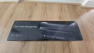 Cable tray for desk.