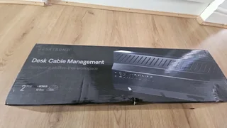 Cable tray for desk.