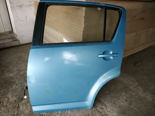 Daihatsu Sirion left rear / back door window glass mechanism door lock