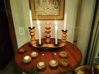 Candle holders made of wood for taller candles