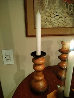 Candle holders made of wood for taller candles