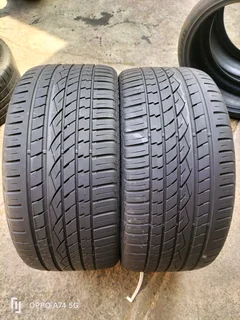 2x 305/30/23 continental Cross contact UHP