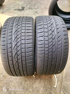 2x 305/30/23 continental Cross contact UHP